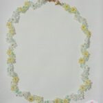 Collar chaquira blanco y amarillo